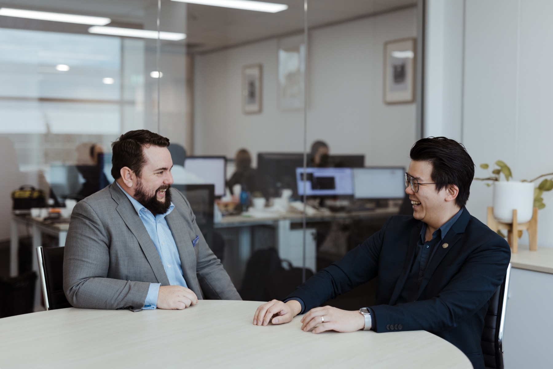 Nathan and Sandy talking in the Wave office